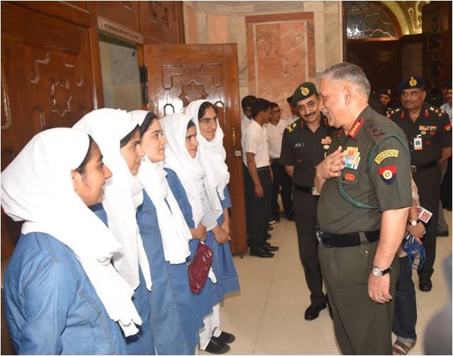 Gen Rawat interacting with the girls