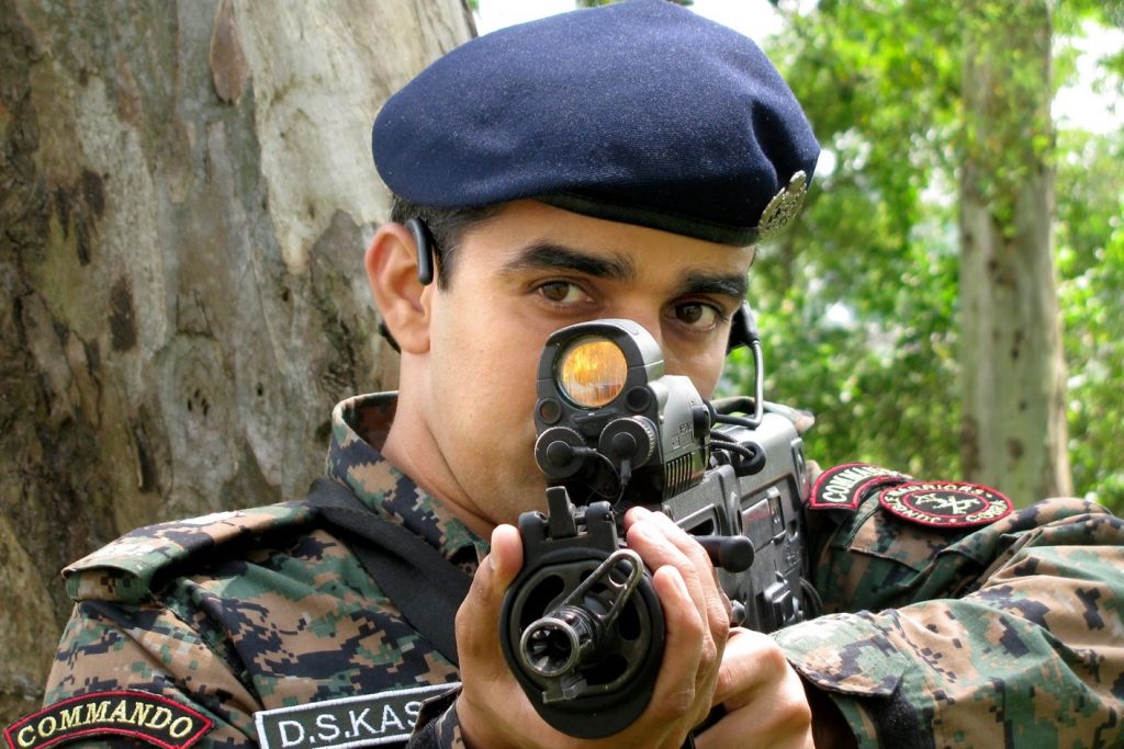 COBRA soldiers taking aim with Israeli X95