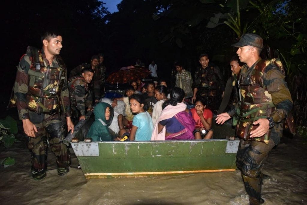 Locals being evacuated in makeshift boats