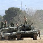 Ukrainian Leopard Tanks Begin to Equip Steel Anti-Drone Shields