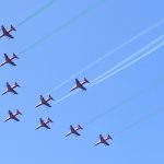 Suryakiran Aerobatic Team Delights Hyderabad with Thrilling Air Show over Hussain Sagar Lake