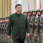 XI